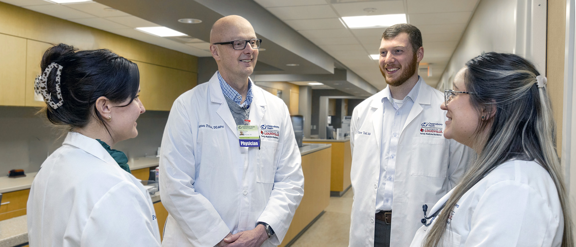 doctors circled together speaking
