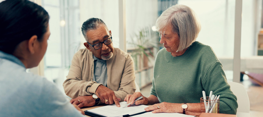 people going over paperwork