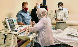 residents practicing reading vitals