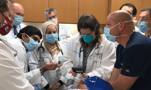 group of residents learning a procedure