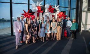 group photo with balloons and window